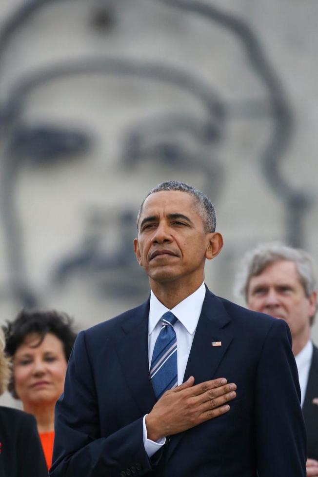 Obama In Cuba with Che Guevara Behind