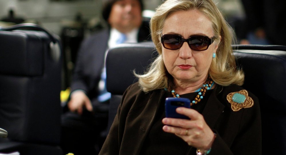 Hillary Clinton On Her Cell Phone - Blackberry